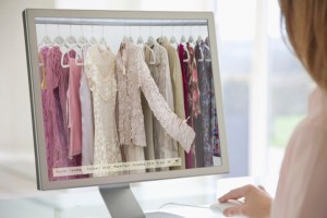 Woman browsing a digital clothes rail on-line